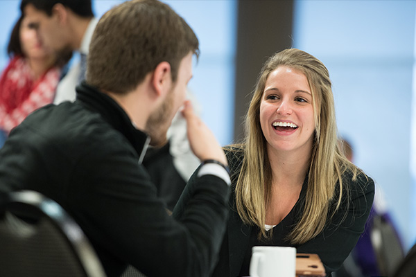 Two students talking to each other